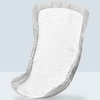 Depend Men Guards pad on its own showing the cupped shape