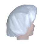 Confident Care Rinse Free Shampoo Cap worn on the head
