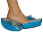 Bare foot resting on the Push Cush Mobility Cushion